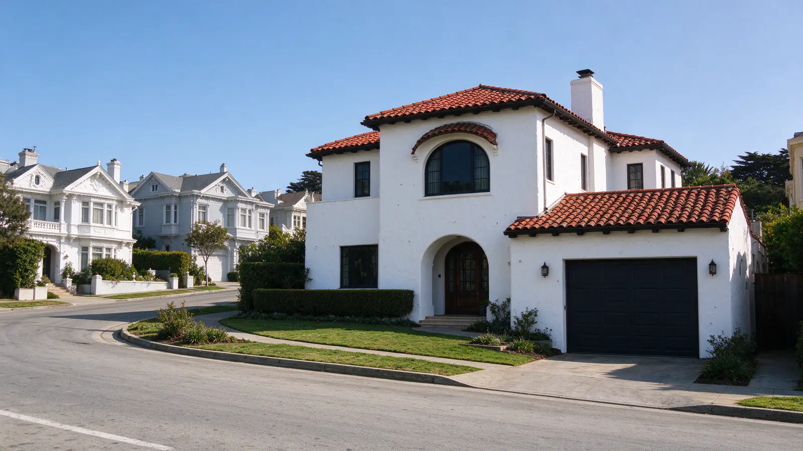 A detached 1920s Spanish-revival house set back behind a small lawn on a curving residence-park street west of Twin Peaks, with no overhead power lines